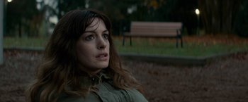Movie still from “Colossal” (2016), directed by Nacho Vigalondo – A person with long brown hair; Close Up shot, High angle