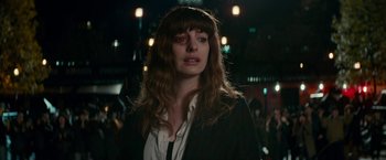 Movie still from “Colossal” (2016), directed by Nacho Vigalondo – A person with long hair; Close Up shot, Over the shoulder angle
