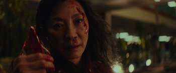 A person with blood on her face