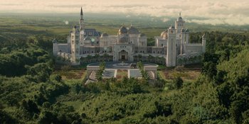 Movie still from “Coming 2 America” (2021), directed by Craig Brewer – An aerial view of a large castle like building; Extreme Wide shot, High angle