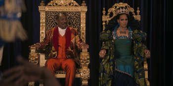 Movie still from “Coming 2 America” (2021), directed by Craig Brewer – A man and a woman sitting on a throne; Medium shot, Over the shoulder angle