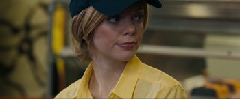 Movie still from “Compliance” (2012), directed by Craig Zobel – A person wearing a hat; Close Up shot, Over the shoulder angle