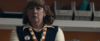 Movie still from “Compliance” (2012), directed by Craig Zobel – A person wearing a necklace; Close Up shot, Over the shoulder angle