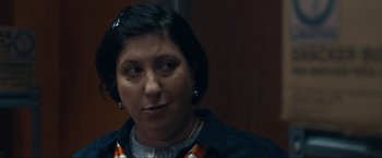 Movie still from “Compliance” (2012), directed by Craig Zobel – A person wearing a necklace; Close Up shot, Over the shoulder angle