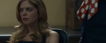 Movie still from “Compliance” (2012), directed by Craig Zobel – A person sitting in a chair; Close Up shot, Over the shoulder angle