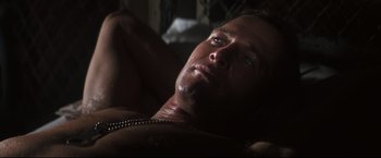 Movie still from “Cool Hand Luke” (1967), directed by Stuart Rosenberg – A person laying on a bed; Close Up shot, Low angle