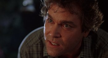 Movie still from “Cop Land” (1997), directed by James Mangold – A person with a nose ring; Close Up shot, Low angle