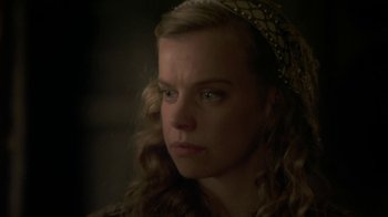 Movie still from “Crooked House” (2017), directed by Gilles Paquet-Brenner – A person wearing a head scarf; Close Up shot, Over the shoulder angle