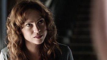 Movie still from “Curse of Chucky” (2013), directed by Don Mancini – A person with curly hair; Close Up shot, Over the shoulder angle