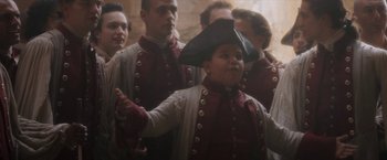 Movie still from “Cyrano” (2021), directed by Joe Wright – A group of men in period clothing standing next to each other; Medium shot, Low angle