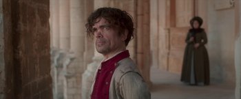 Movie still from “Cyrano” (2021), directed by Joe Wright – Peter dinklage as tyrion lannister in game of thrones; Medium shot, Low angle