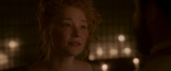 Movie still from “Cyrano” (2021), directed by Joe Wright – A person with curly red hair; Close Up shot, Over the shoulder angle