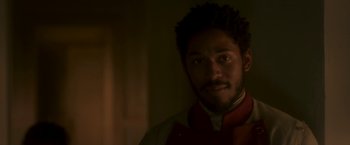 Movie still from “Cyrano” (2021), directed by Joe Wright – A person with a beard; Close Up shot, Over the shoulder angle