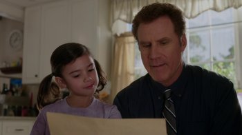 Movie still from “Daddy's Home” (2015), directed by Sean Anders – A man and a little girl looking at a piece of paper; Close Up shot, Over the shoulder angle