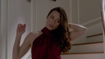 Movie still from “Daddy's Home” (2015), directed by Sean Anders – A woman in a red dress posing for a picture; Close Up shot, Over the shoulder angle
