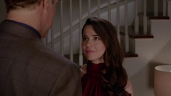 Movie still from “Daddy's Home” (2015), directed by Sean Anders – A woman in a red dress talking to a man in a suit; Close Up shot, Over the shoulder angle