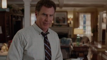 Movie still from “Daddy's Home” (2015), directed by Sean Anders – A man wearing a plaid shirt and a neck tie; Medium shot, Over the shoulder angle