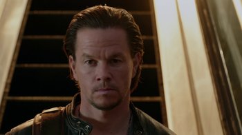 Movie still from “Daddy's Home” (2015), directed by Sean Anders – A person wearing a leather jacket; Close Up shot, Low angle