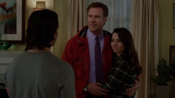 Movie still from “Daddy's Home” (2015), directed by Sean Anders – A man and a woman standing next to each other in a room; Medium shot, Over the shoulder angle