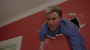 Movie still from “Daddy's Home” (2015), directed by Sean Anders – A man is laying on the floor of a room; Medium shot, Overhead angle