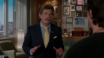 Movie still from “Daddy's Home” (2015), directed by Sean Anders – A man in a blue suit and a yellow tie; Medium shot, Over the shoulder angle