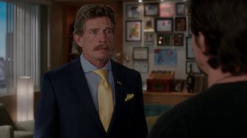 Movie still from “Daddy's Home” (2015), directed by Sean Anders – A man in a blue suit and a yellow tie; Close Up shot, Over the shoulder angle