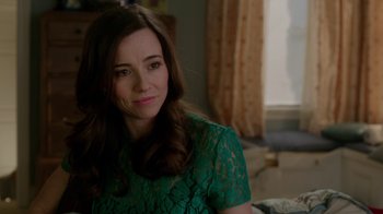Movie still from “Daddy's Home” (2015), directed by Sean Anders – A person wearing a green dress; Close Up shot, Over the shoulder angle
