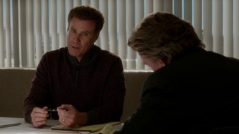 Movie still from “Daddy's Home” (2015), directed by Sean Anders – Two men sitting at a table talking to each other; Medium shot, Over the shoulder angle