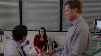 Movie still from “Daddy's Home” (2015), directed by Sean Anders – Two men and a woman sitting in a waiting room; Medium shot, Over the shoulder angle