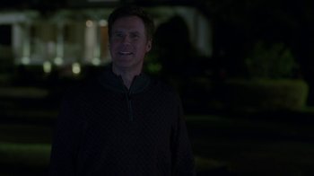 Movie still from “Daddy's Home” (2015), directed by Sean Anders – A man standing in the dark at night; Medium shot, Over the shoulder angle