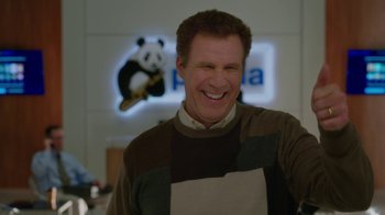 Movie still from “Daddy's Home” (2015), directed by Sean Anders – A man smiling for the camera in front of a panda sign; Medium shot, Over the shoulder angle