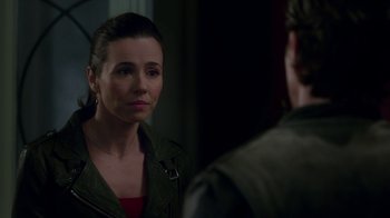 Movie still from “Daddy's Home” (2015), directed by Sean Anders – A woman in a green jacket looking at a man in a green jacket; Close Up shot, Over the shoulder angle