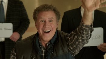 Movie still from “Daddy's Home 2” (2017), directed by Sean Anders – An older man smiling and holding his arms up; Medium shot, Low angle