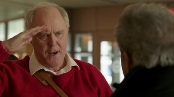 Movie still from “Daddy's Home 2” (2017), directed by Sean Anders – An older man wearing a red sweater talking to another older man; Close Up shot, Over the shoulder angle