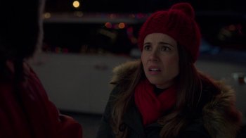 Movie still from “Daddy's Home 2” (2017), directed by Sean Anders – A woman wearing a red hat and a red scarf; Close Up shot, Over the shoulder angle
