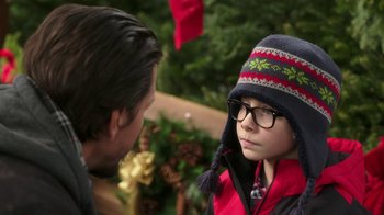 Movie still from “Daddy's Home 2” (2017), directed by Sean Anders – A man and a boy wearing glasses and a hat; Close Up shot, Over the shoulder angle