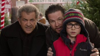 Movie still from “Daddy's Home 2” (2017), directed by Sean Anders – Two men and a boy posing for a picture together; Close Up shot, Over the shoulder angle