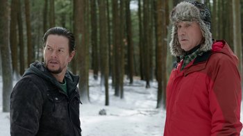 Movie still from “Daddy's Home 2” (2017), directed by Sean Anders – Two men standing next to each other in the woods; Medium shot, Over the shoulder angle