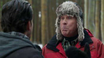 Movie still from “Daddy's Home 2” (2017), directed by Sean Anders – A man wearing a fur hat talking to another man; Close Up shot, Over the shoulder angle