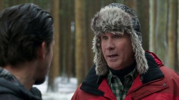 Movie still from “Daddy's Home 2” (2017), directed by Sean Anders – A man wearing a fur hat talking to another man in the woods; Close Up shot, Over the shoulder angle