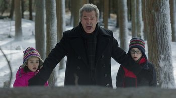 Movie still from “Daddy's Home 2” (2017), directed by Sean Anders – An older man and two young girls in the snow; Medium shot, Low angle