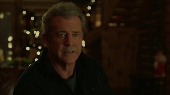 Movie still from “Daddy's Home 2” (2017), directed by Sean Anders – An older man with gray hair is looking at the camera; Close Up shot, Over the shoulder angle