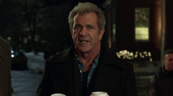 Movie still from “Daddy's Home 2” (2017), directed by Sean Anders – A person holding a cup of coffee; Close Up shot, Over the shoulder angle