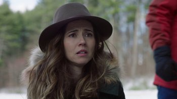 Movie still from “Daddy's Home 2” (2017), directed by Sean Anders – A woman in a hat is looking sad; Close Up shot, Over the shoulder angle