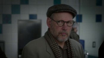 Movie still from “Daddy's Home 2” (2017), directed by Sean Anders – An older man wearing glasses and a hat; Close Up shot, Over the shoulder angle