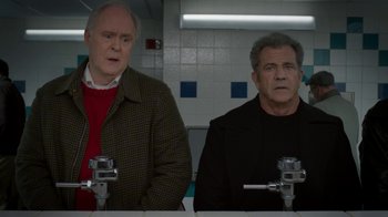Movie still from “Daddy's Home 2” (2017), directed by Sean Anders – Two men standing next to each other in front of a sink; Medium shot, Over the shoulder angle