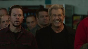 Movie still from “Daddy's Home 2” (2017), directed by Sean Anders – A group of men standing next to each other in a room; Close Up shot, Over the shoulder angle