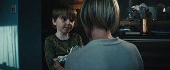 Movie still from “Daniel Isn't Real” (2019), directed by Adam Egypt Mortimer – A woman and a boy are looking at each other; Close Up shot, Over the shoulder angle