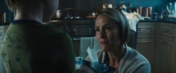 Movie still from “Daniel Isn't Real” (2019), directed by Adam Egypt Mortimer – A woman sitting at a table in front of a person; Close Up shot, Over the shoulder angle