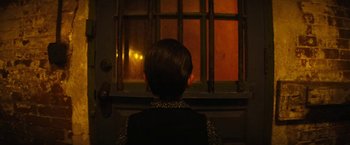 Movie still from “Daniel Isn't Real” (2019), directed by Adam Egypt Mortimer – A child looking out of a window at night; Close Up shot, High angle